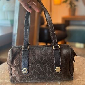 Gucci GG Boston bag in a dark brown suede with gold hardware
